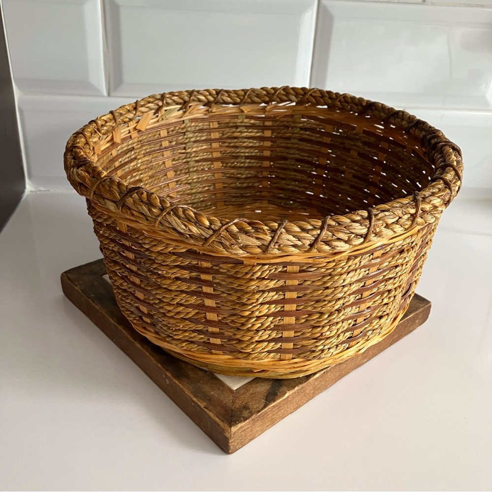 Hand-woven round wicker basket